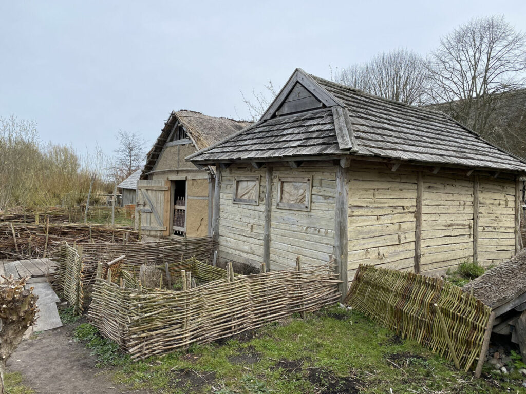 Reconstructed coastal Slavic houses built in the bolt technique with clapboard roofs in the Oldenburger Wallmuseum. Photo: Museum Lolland-Falster.